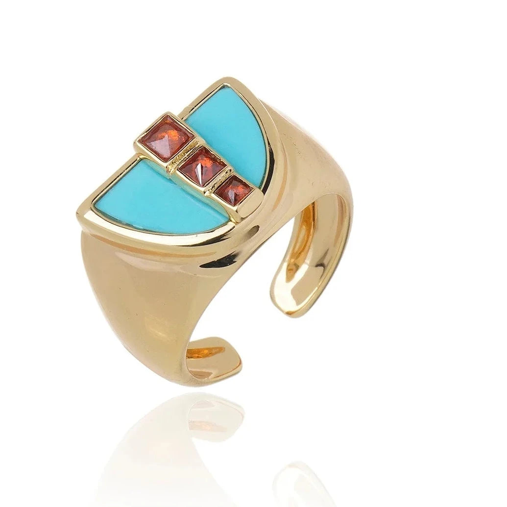 Anillo Symmetry dorado con piedra howlite azul – Trovare Chile