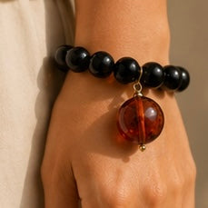 Pulsera de Resina Italiana Negra con Esfera Ámbar