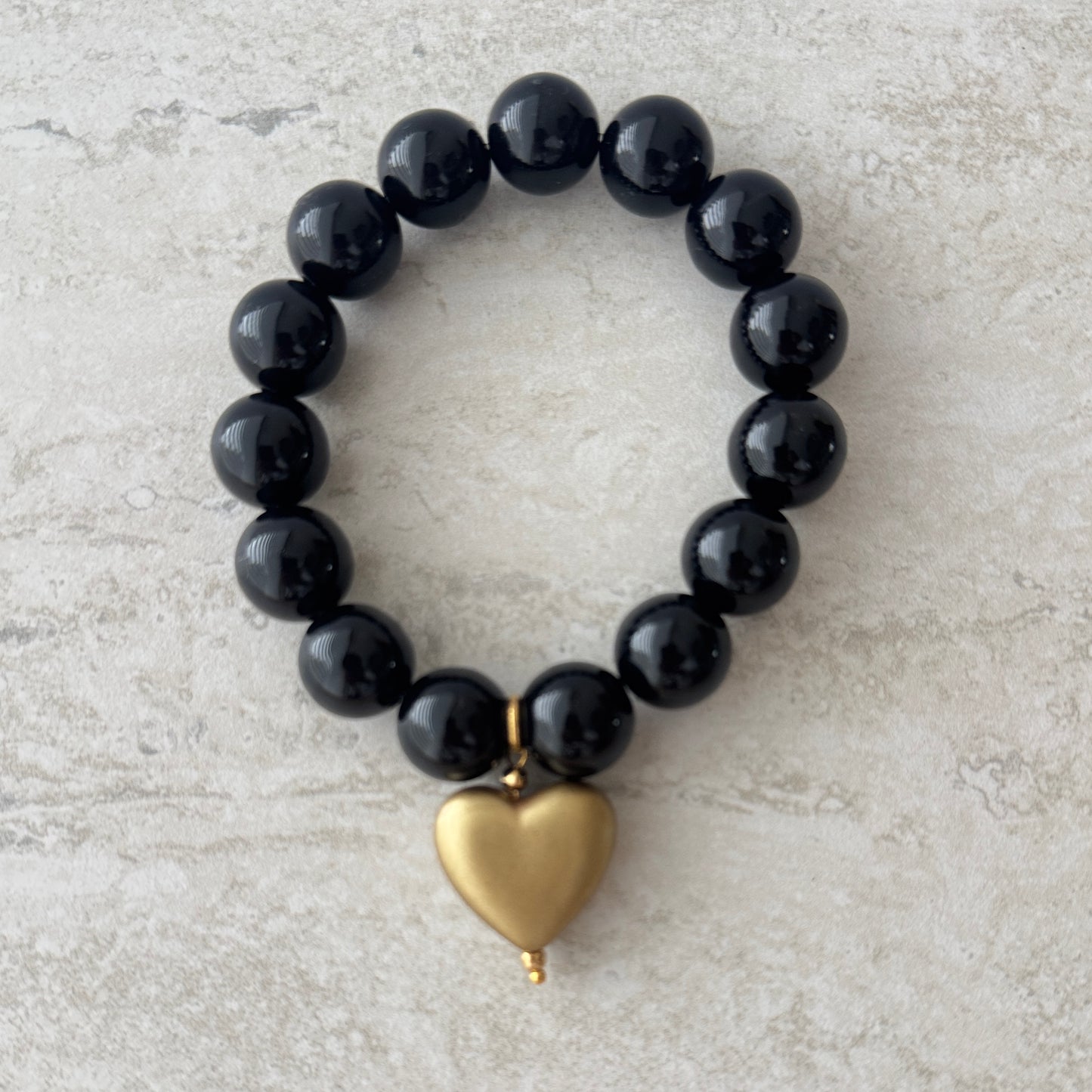 Pulsera Negra Corazón Dorado - Resina Italia