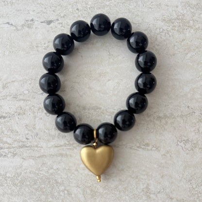 Pulsera Negra Corazón Dorado - Resina Italia