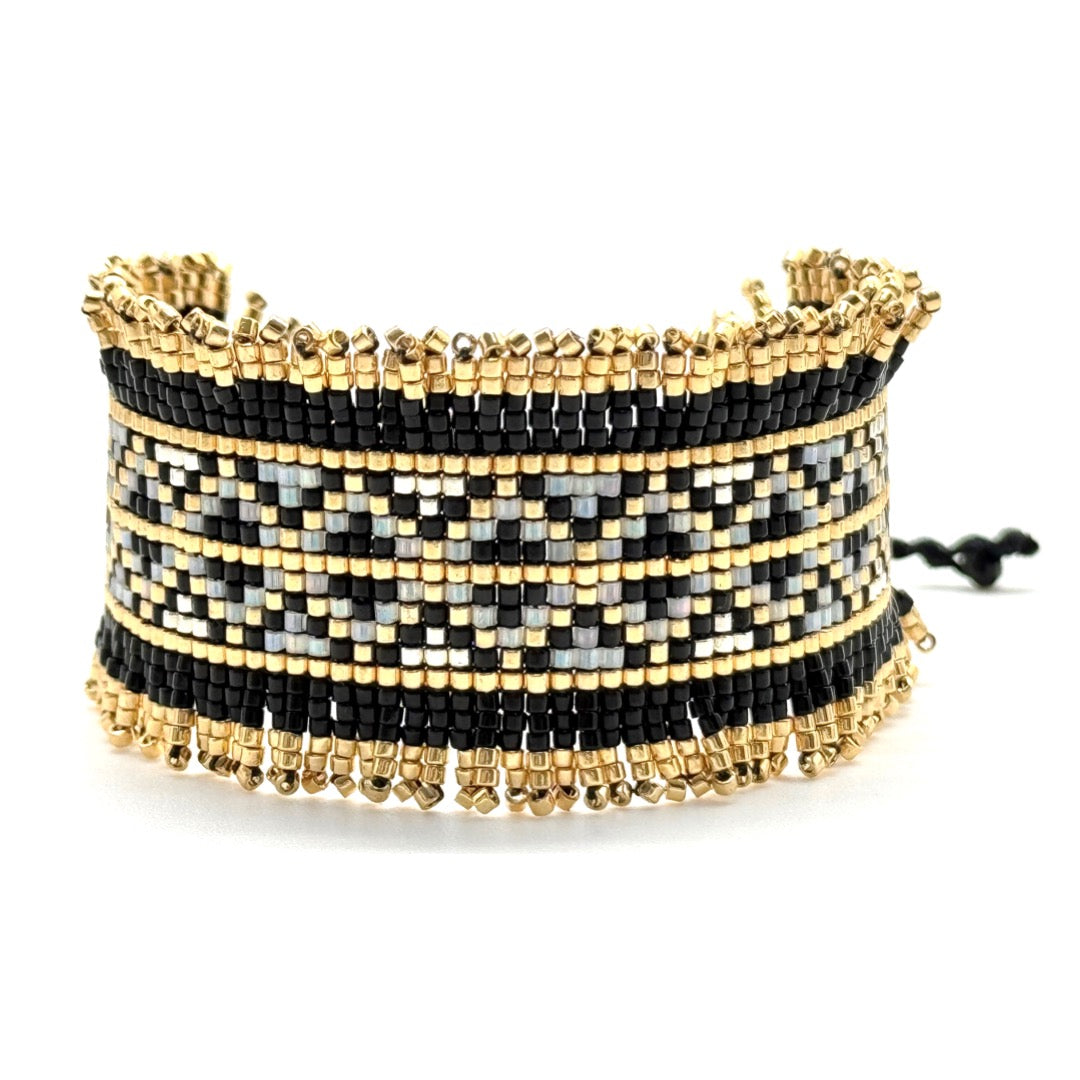 pulsera miyuki negra y dorada hecha a mano