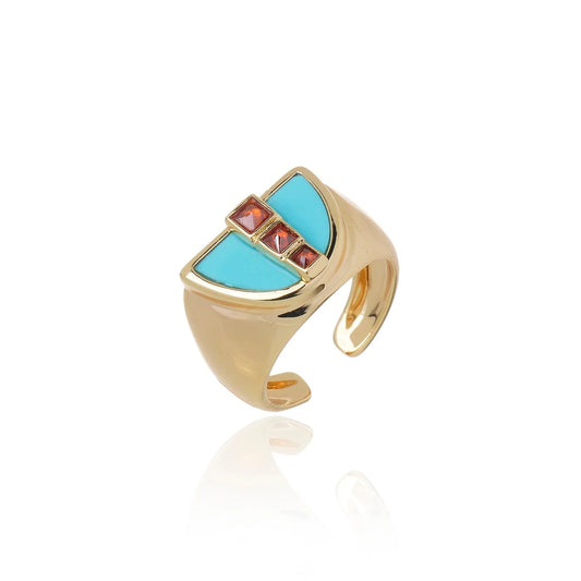Anillo Symmetry dorado con piedra howlite azul – Trovare Chile