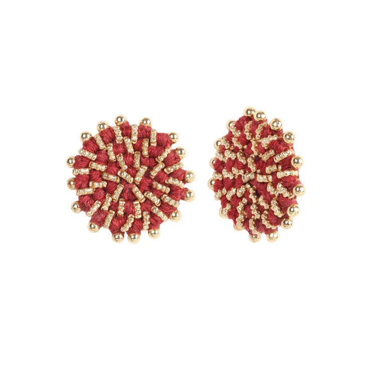 aros circulares terracota y dorado