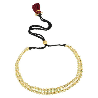 Collar Marina Dorado con pequeños espejos, cordón negro ajustable y borla burdeo