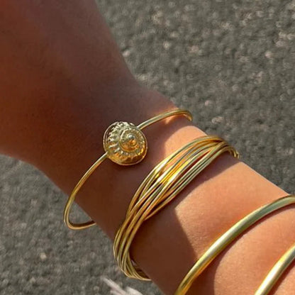 pulsera caracol baño oro