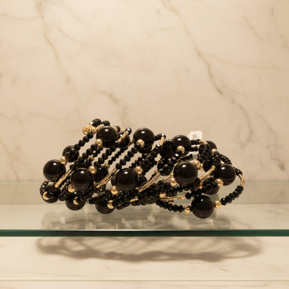 pulsera multivueltas negra y dorado