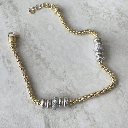 Bracciale Cilindri Lux – Twist en Plata 925 Baño de Oro con Pavé de Zircones