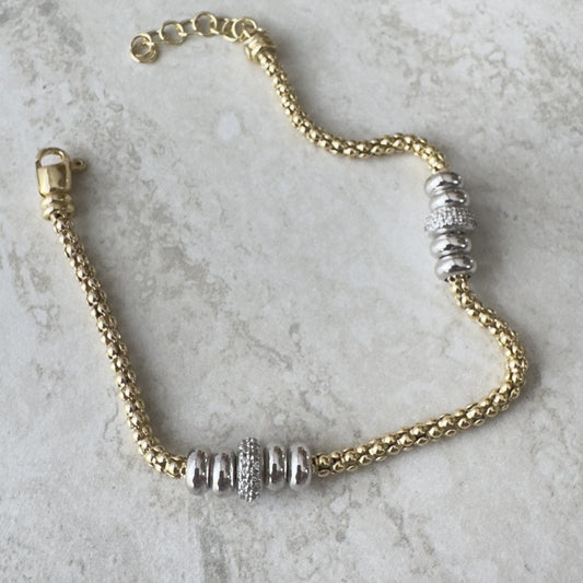 Bracciale Cilindri Lux – Twist en Plata 925 Baño de Oro con Pavé de Zircones