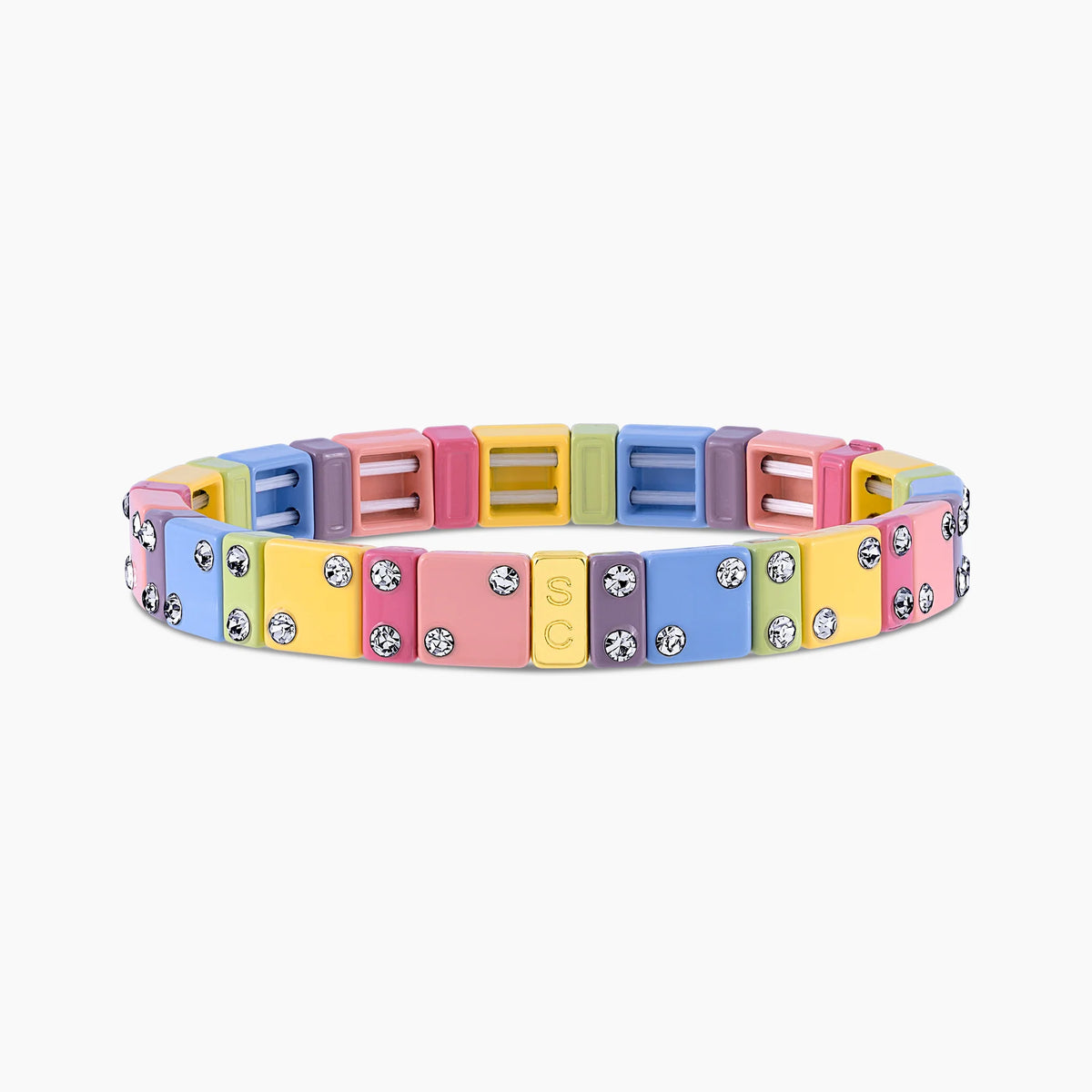 Pulsera elástica Dominó Midi Cotton Candy en tonos pastel rosa, azul, amarillo y lavanda con cristales