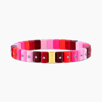 Pulsera Dominó Mini Adore en rosa claro, fucsia, rojo cereza y burdeos con cristales.